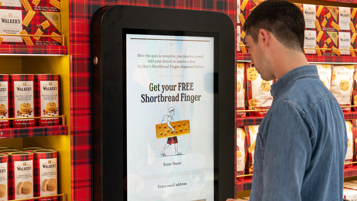 Walker's shortbread vending machine wrapped in heritage tartan at Edinburgh Airport